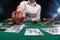 Poker game in a casino, online gaming business. Success and big winnings