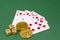 Poker game objects - game cards, dice and bitcoins on a green background