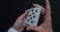 Poker game - shuffling cards. Man`s hands shuffing cards. Close up. Man`s hands shuffling playing cards. Dealer`s hands