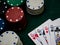 poker game table, four queens with playing chips