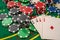 poker play cards and chips on green table