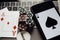 Poker play online. Poker chips, playing cards and smartphone on keyboard