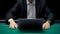 Poker player waiting for online opponents to make bets, competitive gambling