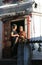 POKHARA, NEPAL. 25 September 2008: Old women in saree - a pilgrim at a Hindu temple of goddess Durga.