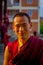 POKHARA, NEPAL - OCTOBER 06 2017: Portrit of young buddhist monk at outdoors at the Tashi refugee settlement in Pokhara