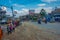 POKHARA, NEPAL OCTOBER 10, 2017: Outdoor view of asphalted road with some motorbikes, cars parked around in the street