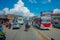 POKHARA, NEPAL OCTOBER 10, 2017: Outdoor view of asphalted road with traffict, some motorbikes, cars parked around in