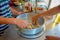 POKHARA, NEPAL OCTOBER 10, 2017: Person cooking a momo food over a metallic tray in the kitchen, type of South Asian