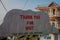 POKHARA, NEPAL, SEPTEMBER 04, 2017: Informative sign of thank you for visit written over a rock at the begging or end of