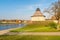 Pokrovskaya fortress Tower of Pskov on the shore of Velikaya river, Russia