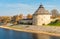 Pokrovskaya fortress Tower of Pskov on the shore of Velikaya river, Russia