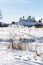 Pokrovskiy Monastery on frozen riverbank in Suzdal