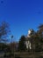 Pokrovsky temple with crows hovering above it on a clear autumn day. South of Russia, Rostov-on-don