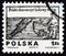 POLAND - CIRCA 1974: A stamp printed in Poland shows angler and fish, circa 1974.