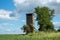 Poland, countryside, landscape with an abandoned transformer tower.