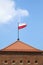 Poland flag on a blue sky background