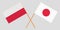Poland and Japan. Crossed Polish and Japanese flags. Official colors. Correct proportion. Vector
