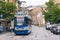 Poland, Krakow 02.18.2020: Old city blue tram on the city street. Eco-friendly urban public transport. urban forestry