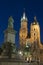 Poland, Krakow, Mickiewicz Monument, st Mary Curch Towers, Dusk
