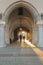 Poland, Krakow, Sukiennice Cloth Hall, passageway seen against daylight in the morning