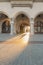 Poland, Krakow, Sukiennice Cloth Hall, passageway seen against daylight in the morning