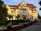 Poland, Kudowa Zdroj - June 18, 2018: View of the resort theater and flower beds at sunset
