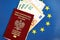 Poland passport of European Union and airlines tickets with money on blue flag background