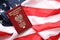 Poland passport on United States national flag background close up. Tourism and diplomacy