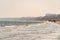 Poland, Sopot, February 9, 2020. People at beach in Sopot. Crowd on Beach During Winter. enjoying day in sunny winter near sea.