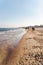 Poland, Sopot, February 9, 2020. People at beach in Sopot. Crowd on Beach During Winter. enjoying day in sunny winter near sea.