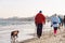 Poland, Sopot, February 9, 2020. People at beach in Sopot. Crowd on Beach During Winter. enjoying day in sunny winter near sea.