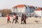 Poland, Sopot, February 9, 2020. People at beach in Sopot. Crowd on Beach During Winter. enjoying day in sunny winter near sea.