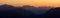 Poland, Tatra Mountains, Zakopane - Tomanowa Pass at sunset with Western Tatra mountain range panorama in background