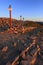 Poland, Tatra Mountains, Zakopane - top of the Kasprowy Wierch peak and mountain trail tourist signs at sunset with Swinica peak