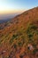 Poland, Tatra Mountains, Zakopane - western slope of Kasprowy Wierch peak at sunset with Western Tatra mountain range panorama in