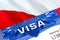 Poland Visa in passport. USA immigration Visa for Poland citizens focusing on word VISA. Travel Poland visa in national