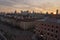 Poland, Warsaw 10.26.2019: the main square of the old city of Warsaw, top view at sunset. houses with red roofs, people walking,