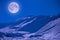 Polar arctic full red super moon eclipse sky star in Norway Svalbard in Longyearbyen city mountains