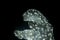Polar bear figure made of tinsel and garlands in the dark.Glowing Christmas figures from garlands in the dark.Christmas