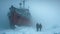 Polar expedition during storm, scenery of frozen ship in ice, snow and walking people in mist. Concept of arctic exploration,