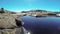 A polar explorer explores a thawed lake in Antarctica.