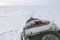 Polar icebreaker navigating through thick ice floe