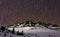 Polaris and star trails over mountain