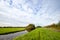 Polder landscape with a single stepping stone at nature reserves in Zaanse Rietveld