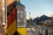 pole with the coat of arms of the GDR stands in a village