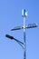 A pole with a innovative LED street light powered by solar panels and vertical wind turbine