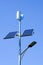 A pole with a innovative LED street light powered by solar panels and vertical wind turbine