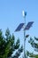 A pole with a innovative LED street light powered by solar panels and vertical wind turbine