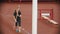 Pole vault training on the stadium - woman running up and jumping over the bar touching it