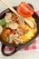 Polenta - corn porridge with stewed chicken in oil